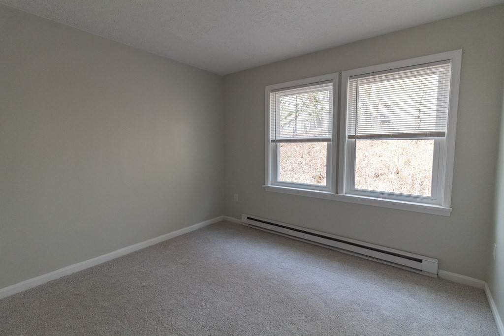 20 Rice Lane, Unit 2 Worcester, MA 01604 - Photo 14 of 17 an empty room with a window