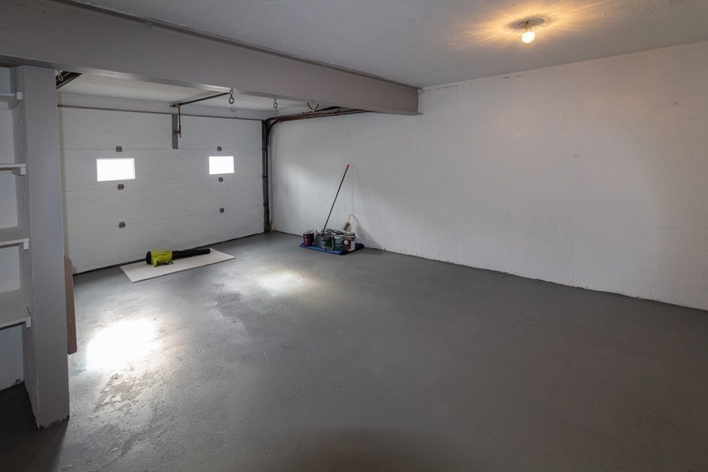 20 Rice Lane, Unit 2 Worcester, MA 01604 - Photo 15 of 17 an empty room with staircase and windows