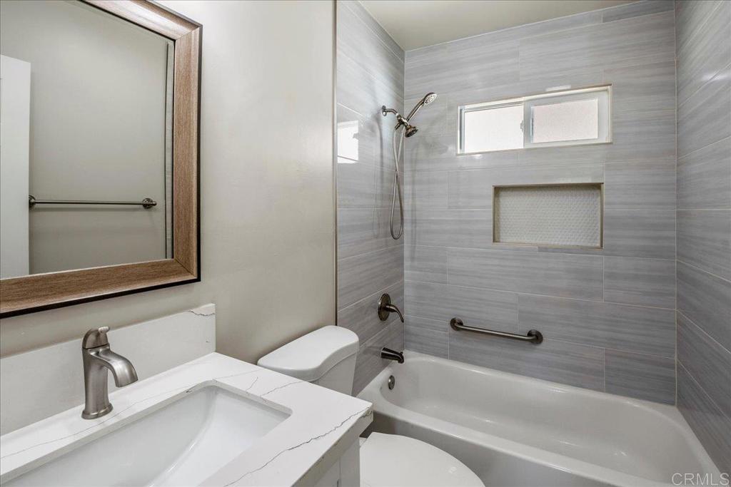 11694 Hi Ridge Road Lakeside, CA 92040 - Photo 24 of 48 a bathroom with a sink a toilet and shower