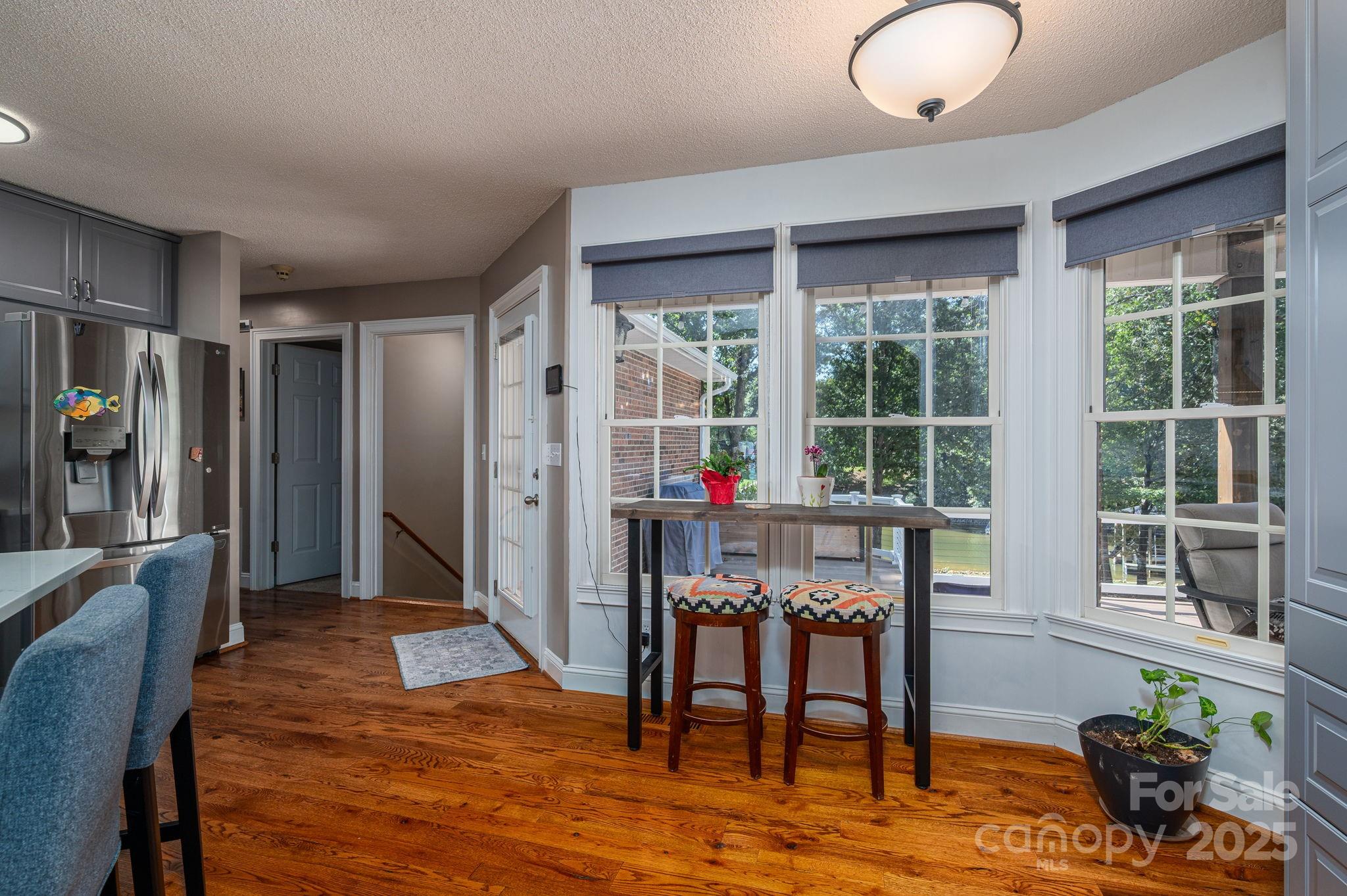 8369 Slate Street Terrell, NC 28682 - Photo 15 of 47 a view of a livingroom with furniture window and wooden floor