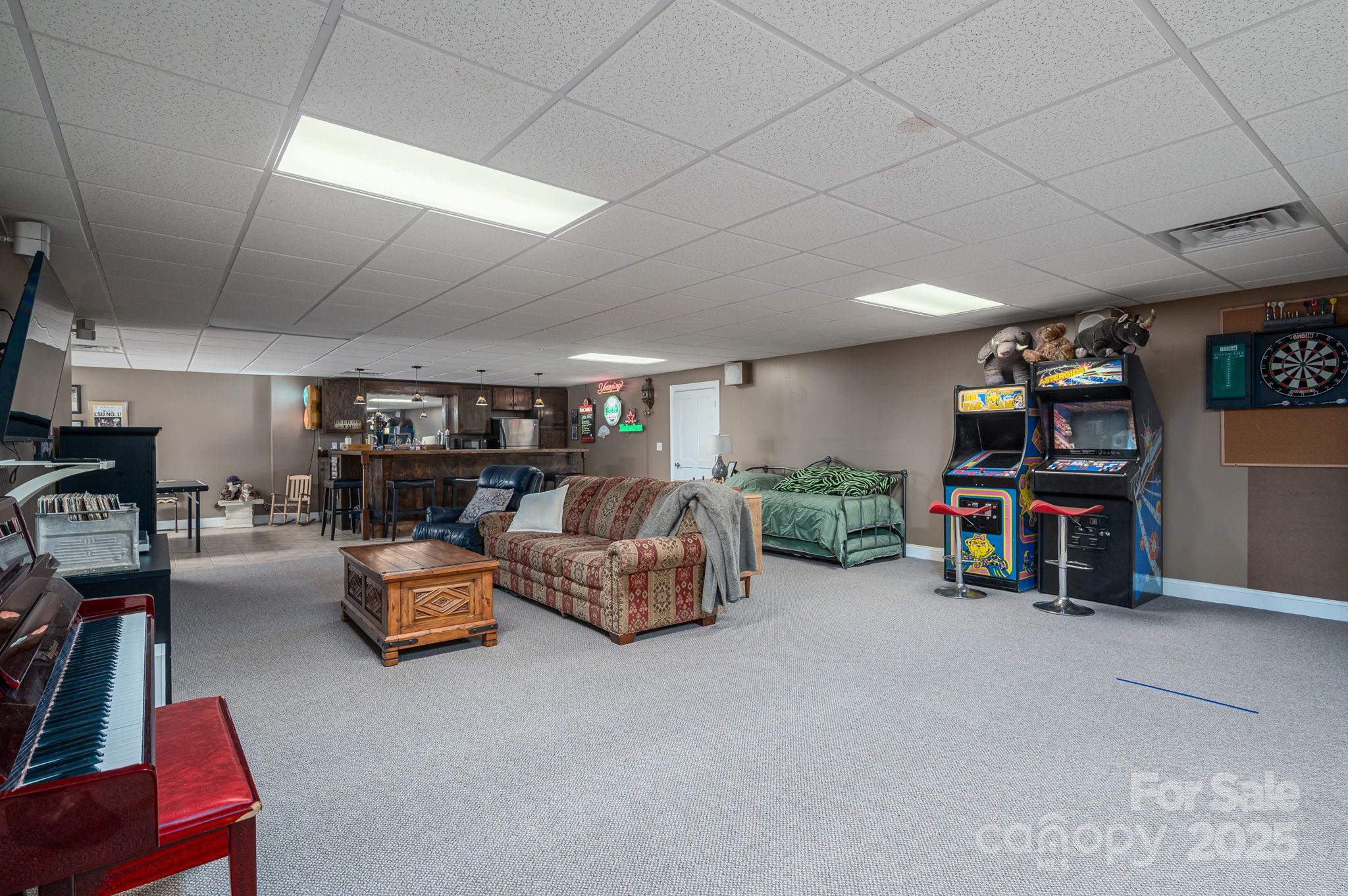 8369 Slate Street Terrell, NC 28682 - Photo 27 of 47 a living room with furniture and a flat screen tv