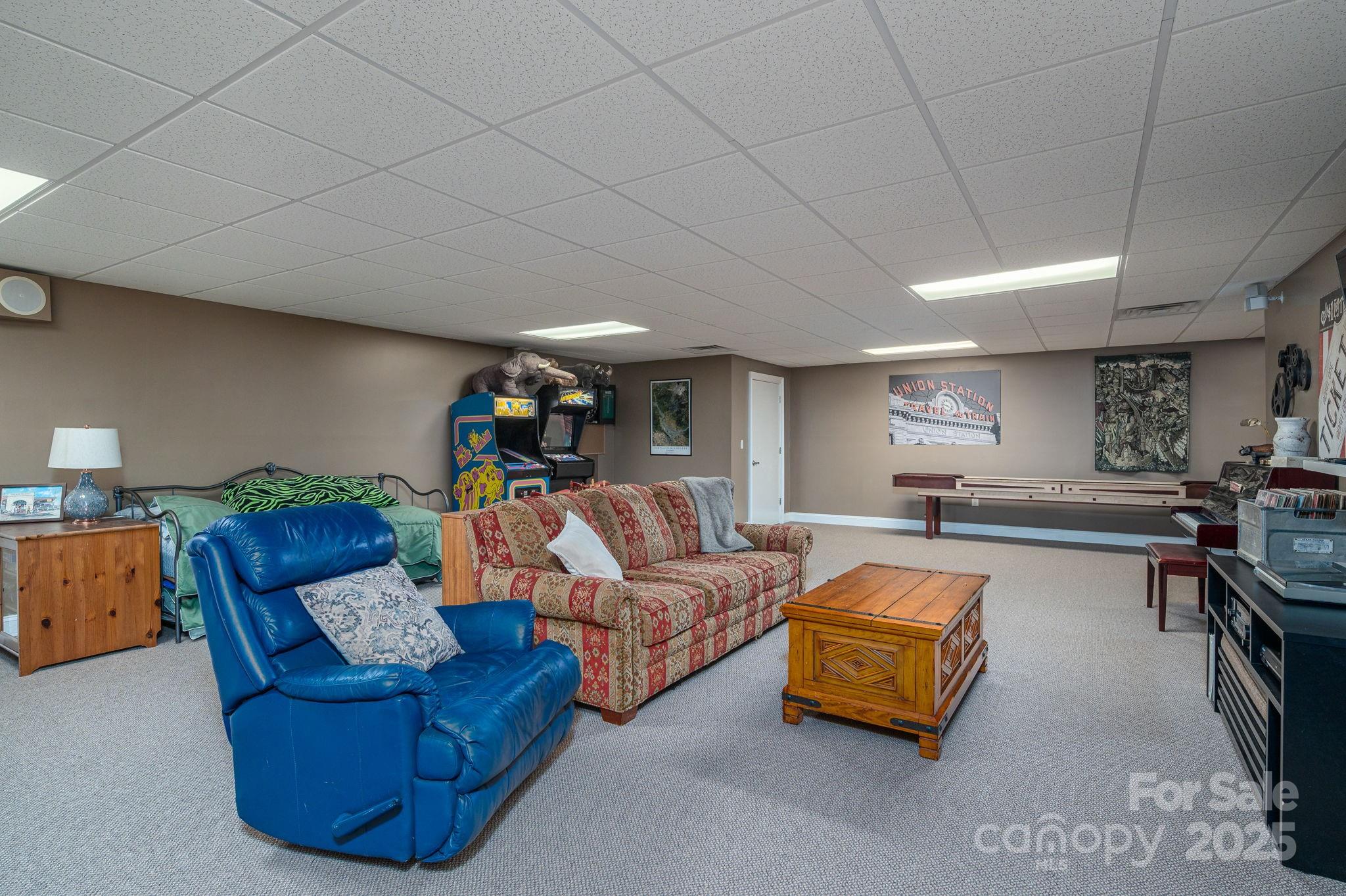 8369 Slate Street Terrell, NC 28682 - Photo 28 of 47 a living room with furniture and a wooden floor