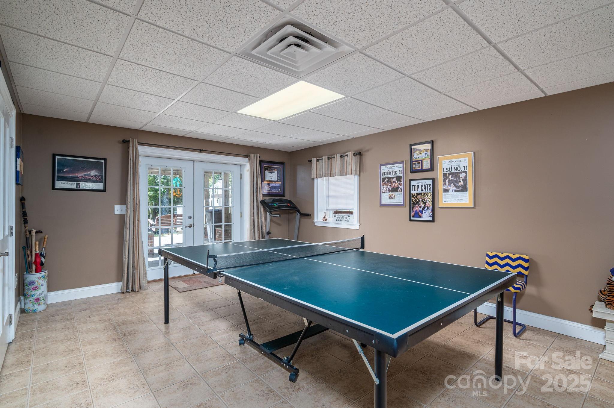 8369 Slate Street Terrell, NC 28682 - Photo 31 of 47 a room with pool table and windows