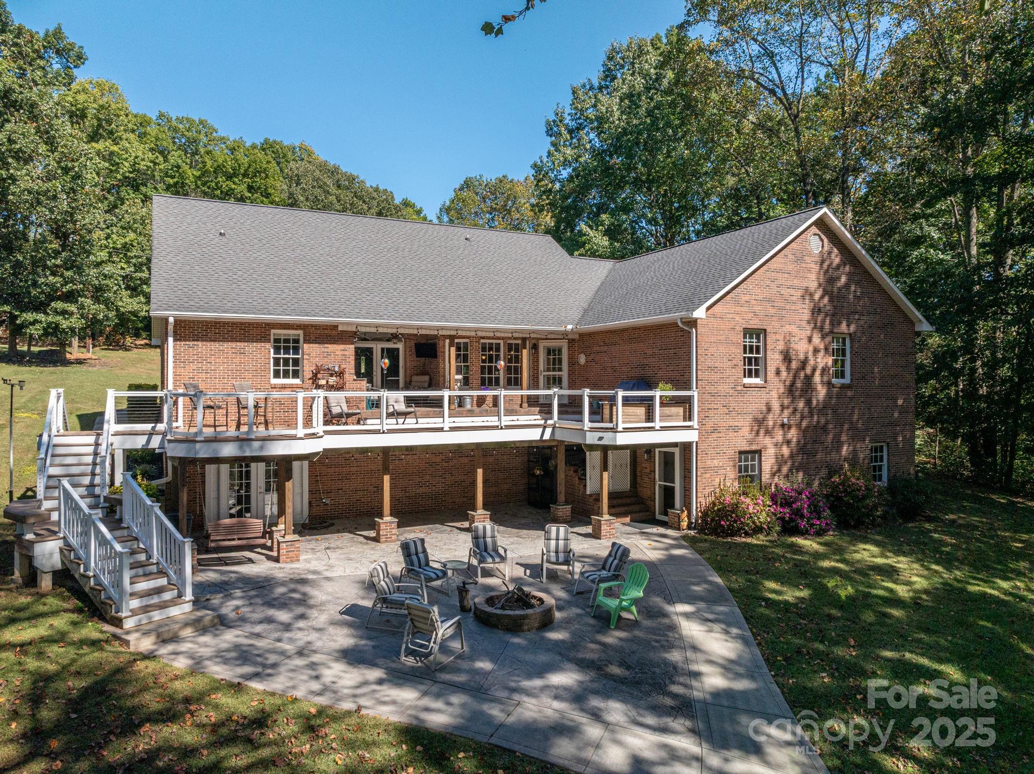 8369 Slate Street Terrell, NC 28682 - Photo 37 of 47 a view of house with a yard and sitting area