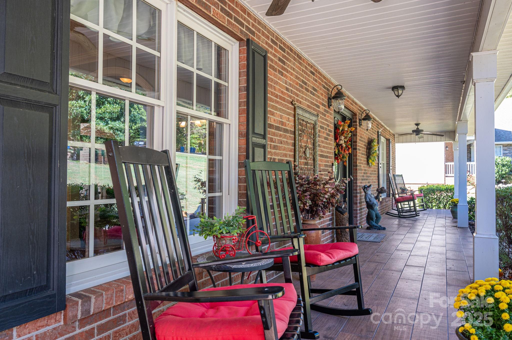 8369 Slate Street Terrell, NC 28682 - Photo 5 of 47 a view of balcony with chairs and potted plants