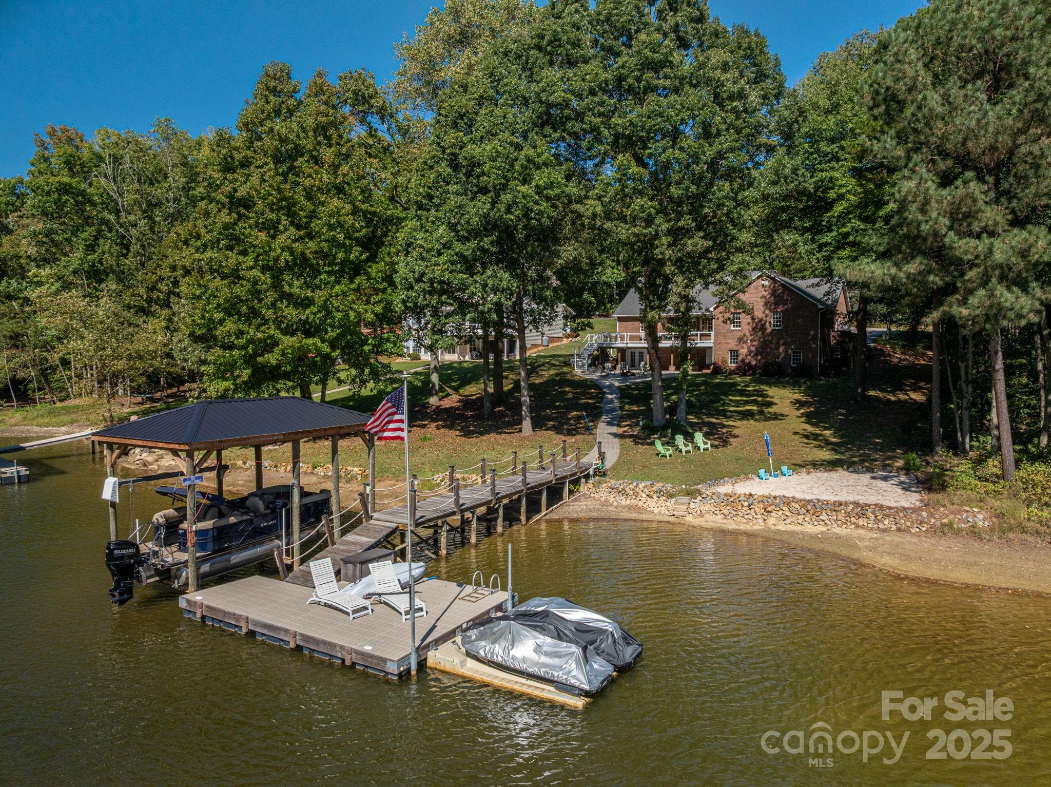 8369 Slate Street Terrell, NC 28682 - Photo 7 of 47 a view of a lake with a house