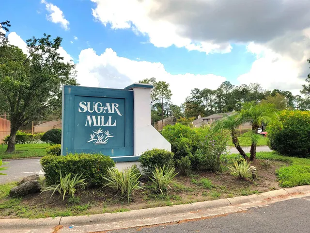 a sign on the side of a road