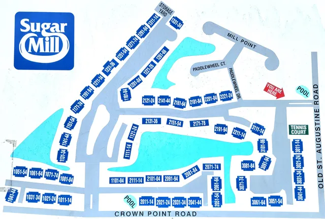 a front view of a dining area with and a book shelf