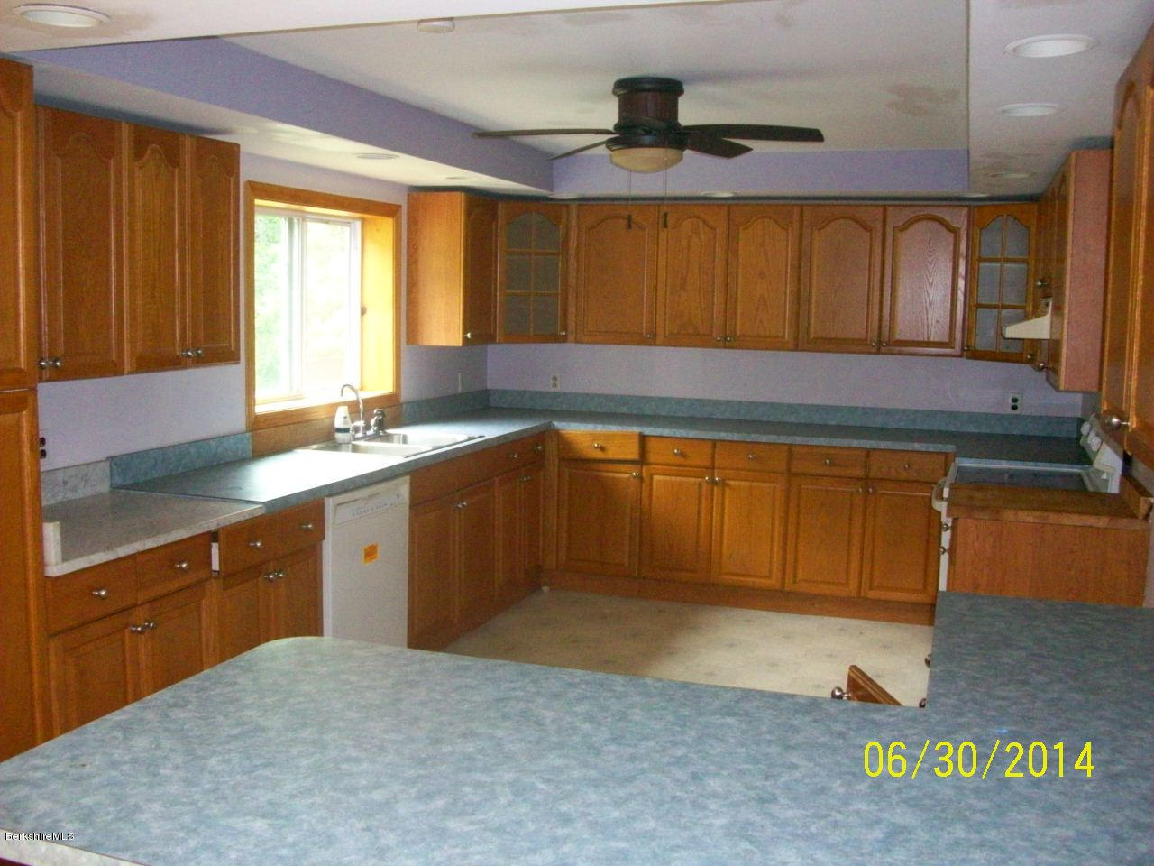 75 West Main Road Peru, MA 01235 - Photo 2 of 10 a kitchen with a sink and a window