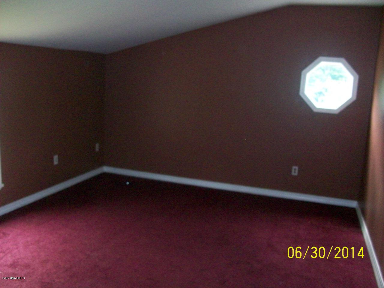 75 West Main Road Peru, MA 01235 - Photo 8 of 10 an empty room with a empty space and a window