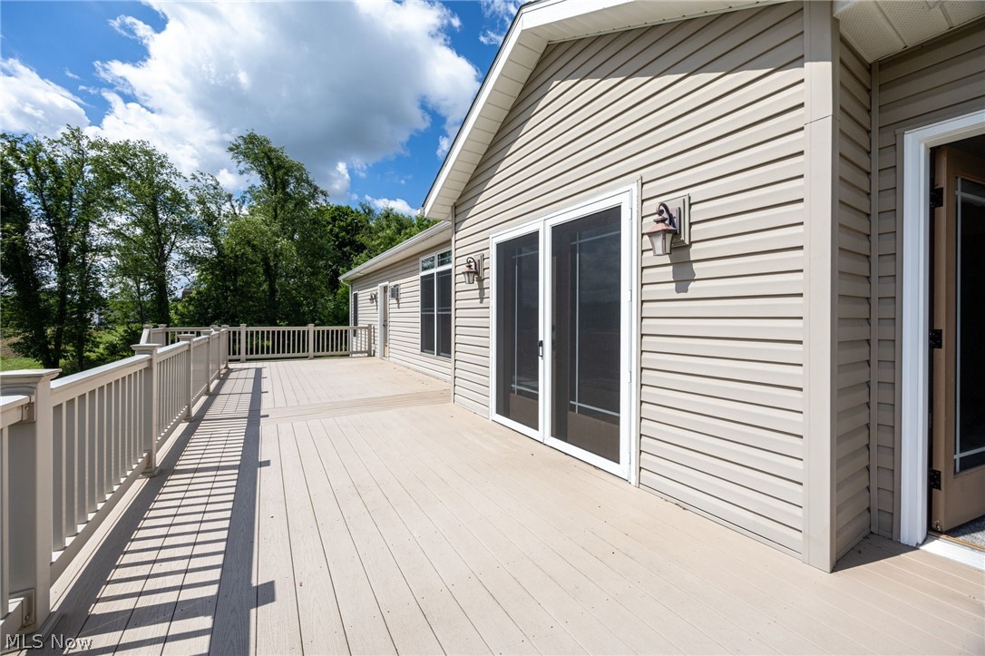 6925 River Styx Road Medina, OH 44256 - Photo 40 of 49 Expansive outdoor deck featuring wood-finish flooring and a full-length railing