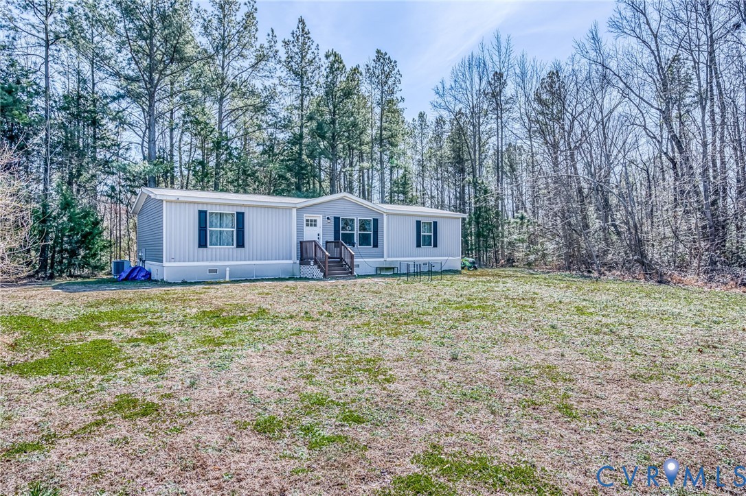 6243 Studley Road Mechanicsville, VA 23116 - Photo 42 of 75 a view of a house with backyard and trees