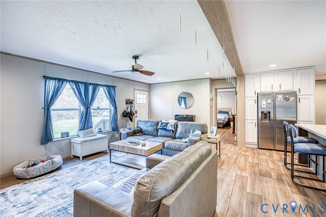 6243 Studley Road Mechanicsville, VA 23116 - Photo 46 of 75 a living room with furniture and a large window
