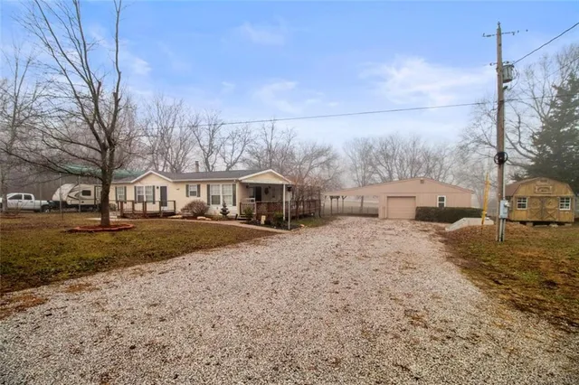 $225,000 | 22304 South Buck Drive, Peculiar, MO 64078