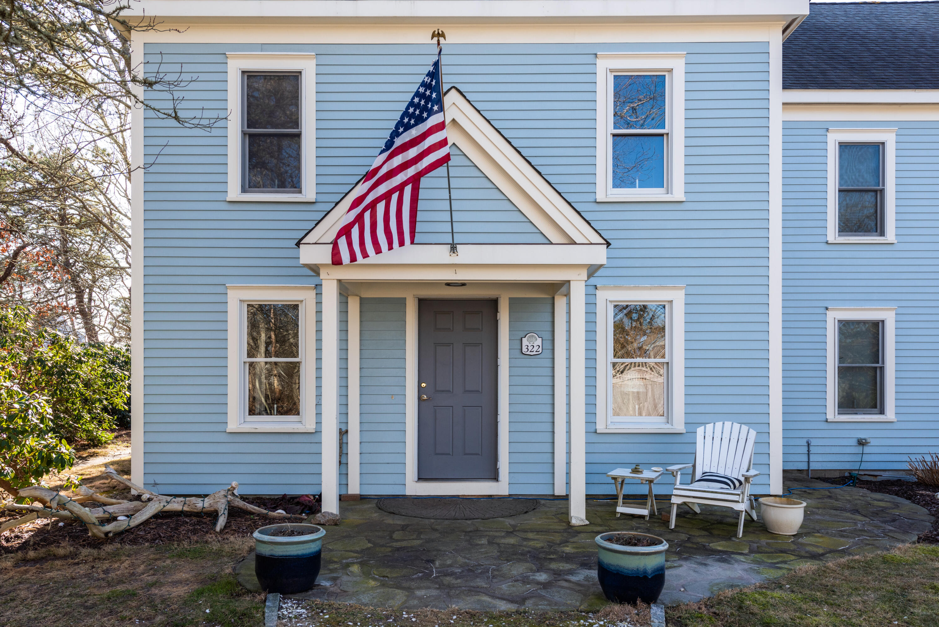 a view of house with outdoor seating