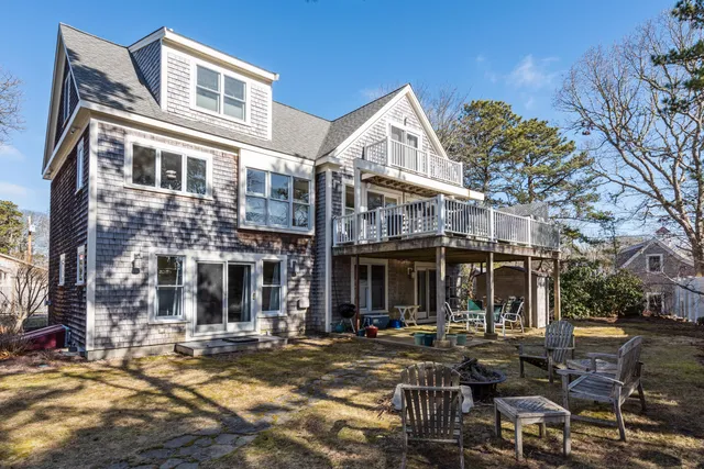 a picture of a bathroom with a white and white wall