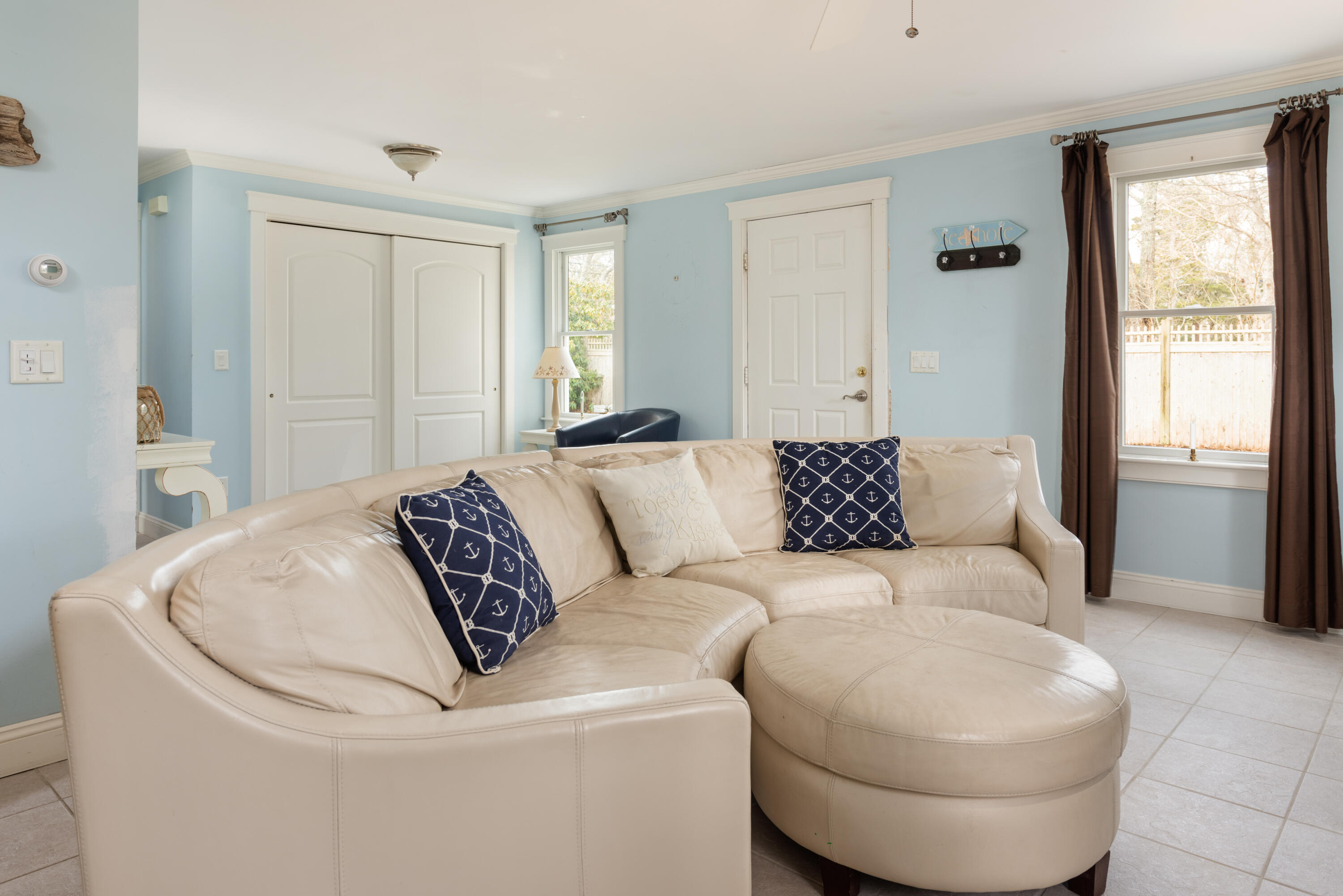 322 Pleasant Street Chatham, MA 02659 - Photo 6 of 39 a living room with furniture and a window