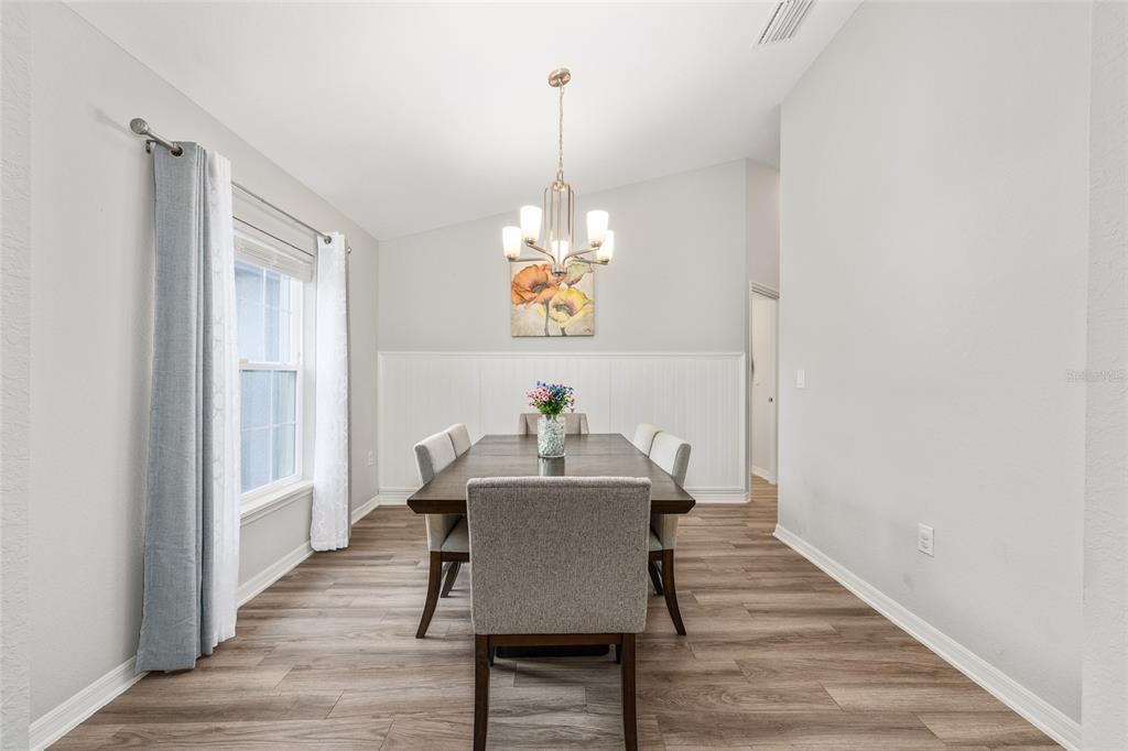 11275 Southwest 54th Circle Ocala, FL 34476 - Photo 19 of 63 a dining room with furniture and window