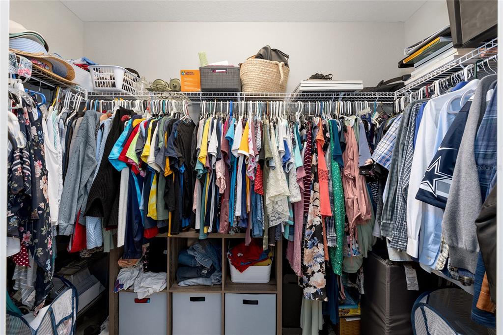11275 Southwest 54th Circle Ocala, FL 34476 - Photo 40 of 63 a view of walk in closet with clothes and shoes