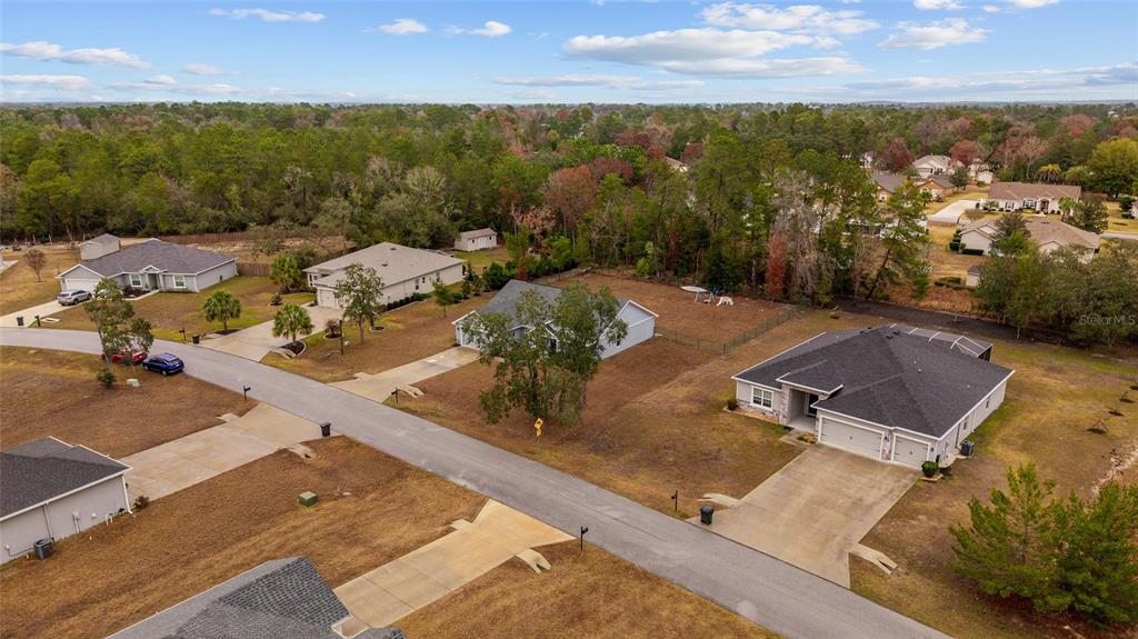 11275 Southwest 54th Circle Ocala, FL 34476 - Photo 51 of 63 an aerial view of residential houses with outdoor space