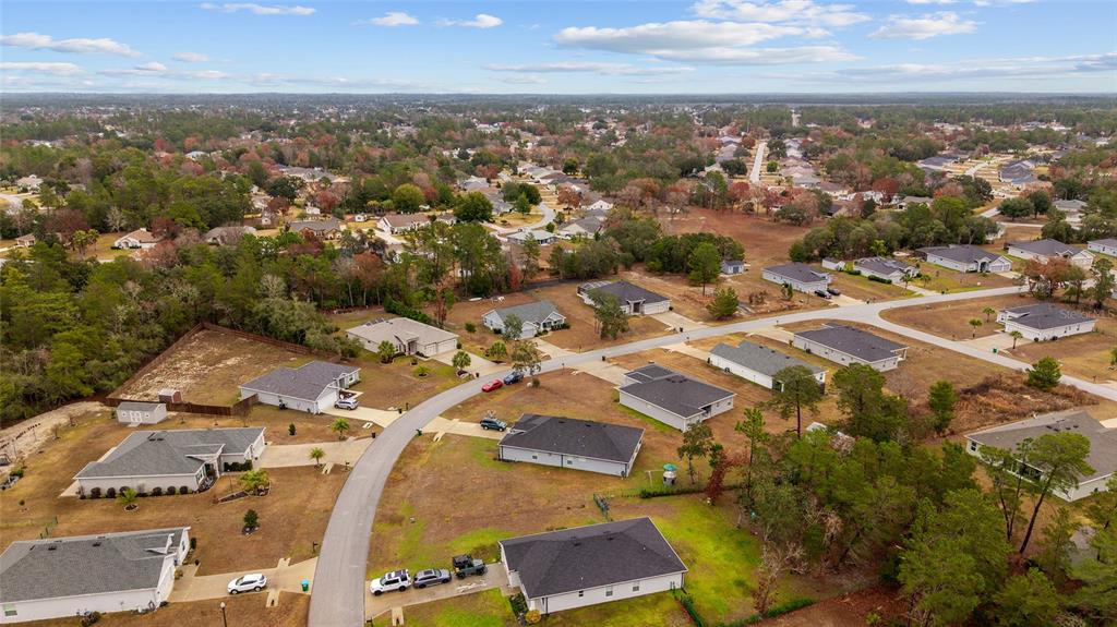 11275 Southwest 54th Circle Ocala, FL 34476 - Photo 53 of 63 an aerial view of residential building with parking space