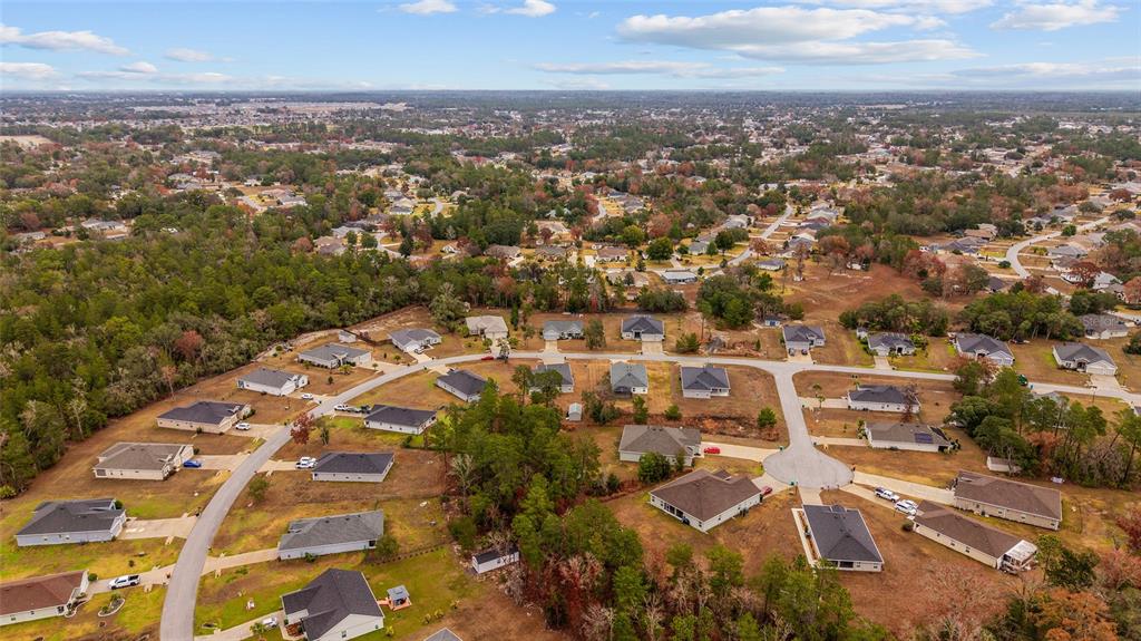 11275 Southwest 54th Circle Ocala, FL 34476 - Photo 55 of 63 an aerial view of residential building with parking space