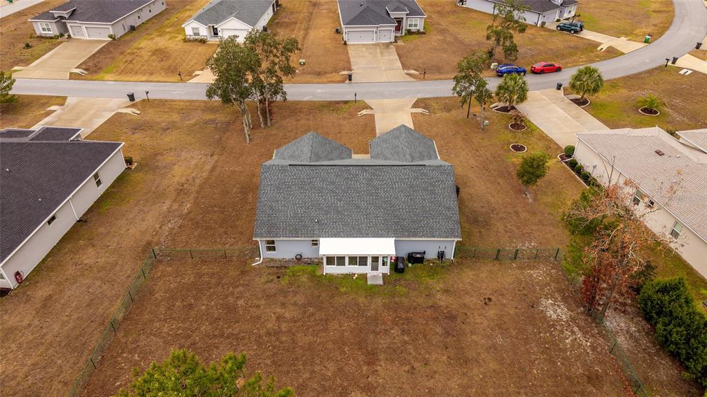 11275 Southwest 54th Circle Ocala, FL 34476 - Photo 59 of 63 an aerial view of a house with a yard