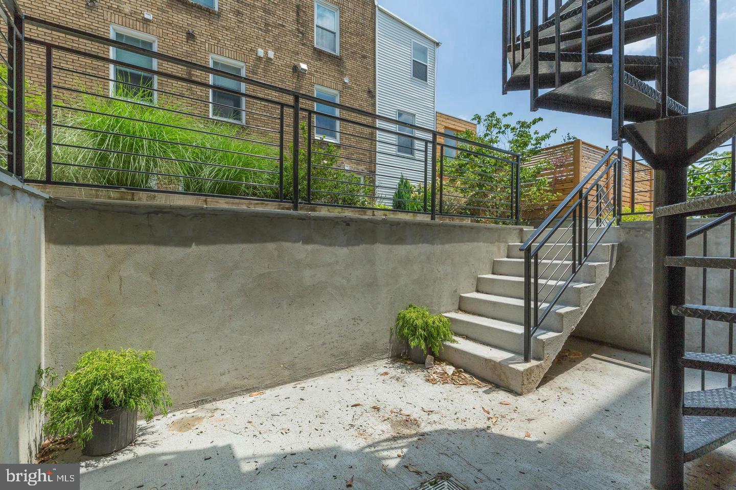 1352 Quincy Street Northwest, Unit 1 Washington, DC 20011 - Photo 19 of 26 a view of a pathway of a building