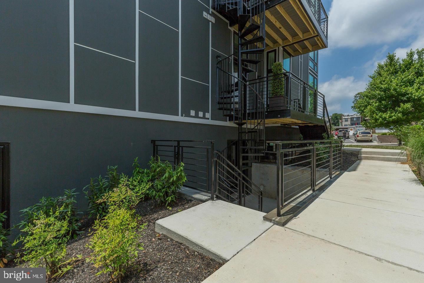 1352 Quincy Street Northwest, Unit 1 Washington, DC 20011 - Photo 21 of 26 a view of entryway with flower pots