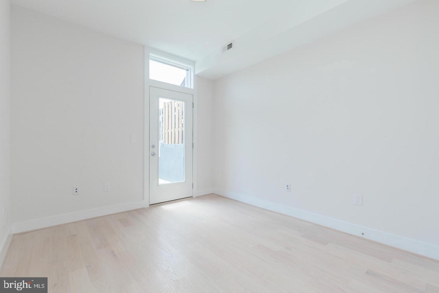 1352 Quincy Street Northwest, Unit 1 Washington, DC 20011 - Photo 24 of 26 a view of an empty room with a window