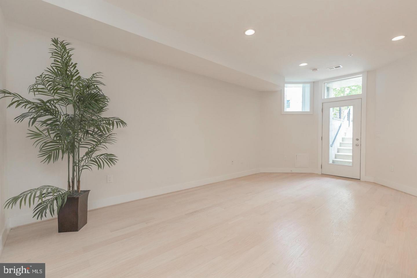 1352 Quincy Street Northwest, Unit 1 Washington, DC 20011 - Photo 10 of 26 an empty room with window and outdoor view