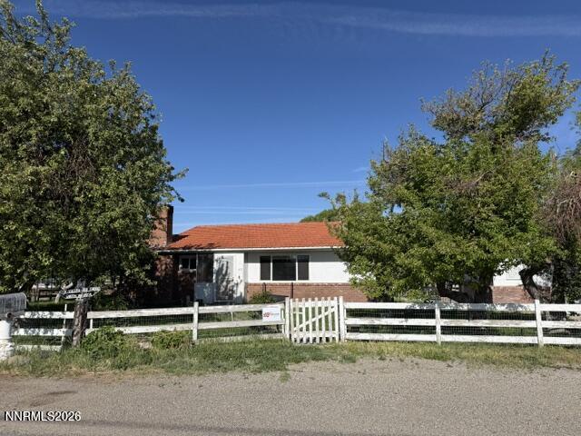 61 Rivers Road Smith, NV 89430 - Photo 24 of 57 a front view of a house with a yard