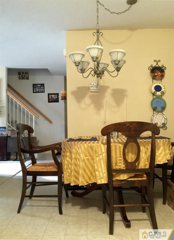 35 Inverness Drive Edison, NJ 08820 - Photo 4 of 15 a bedroom with a bed and a table in it