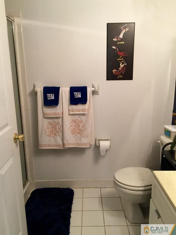 35 Inverness Drive Edison, NJ 08820 - Photo 6 of 15 a bathroom with a toilet and a shower