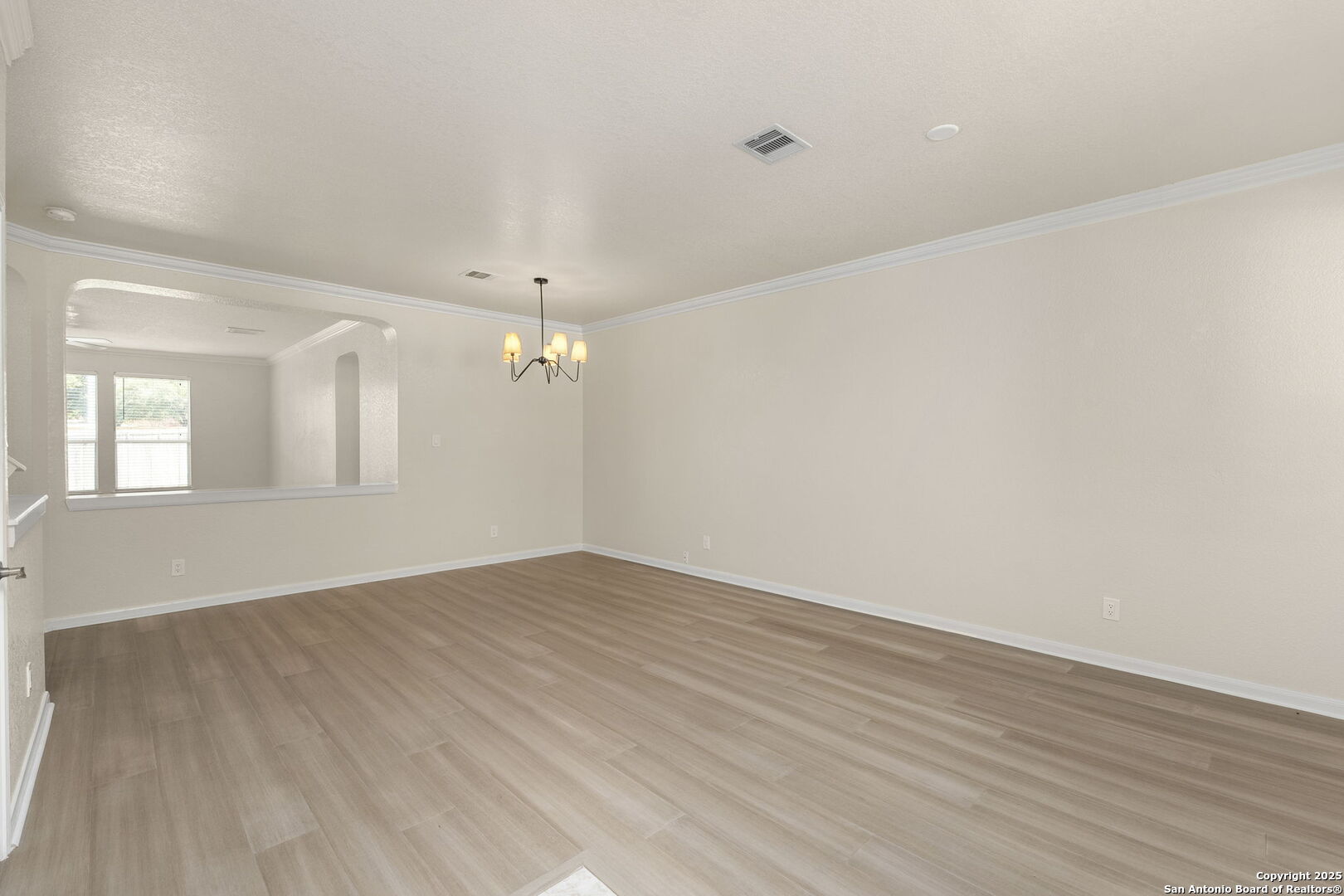 213 Springtree Parkway Cibolo, TX 78108 - Photo 13 of 33 wooden floor in an empty room