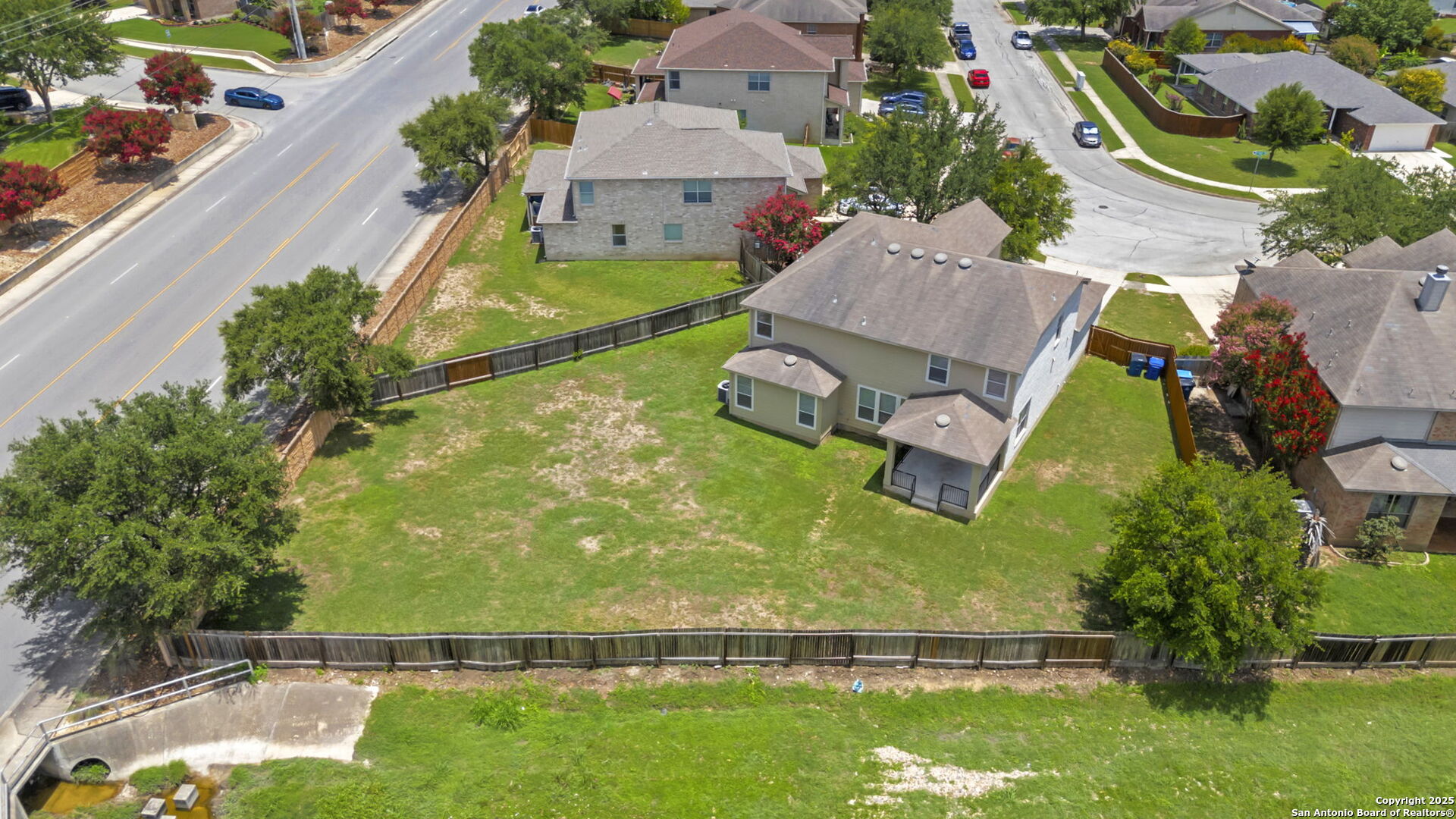213 Springtree Parkway Cibolo, TX 78108 - Photo 2 of 33 an aerial view of a house with a garden and swimming pool