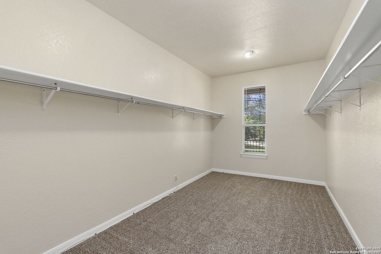 213 Springtree Parkway Cibolo, TX 78108 - Photo 25 of 33 a view of a room with windows