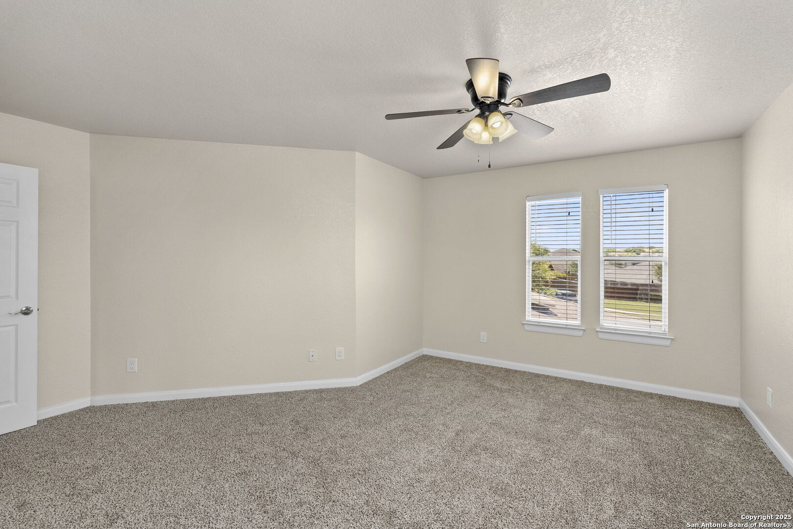 213 Springtree Parkway Cibolo, TX 78108 - Photo 28 of 33 a view of an empty room with a window