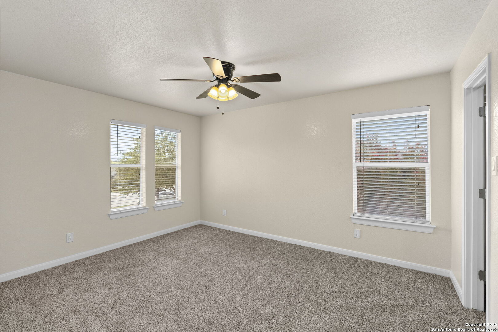 213 Springtree Parkway Cibolo, TX 78108 - Photo 29 of 33 a view of an empty room with a window