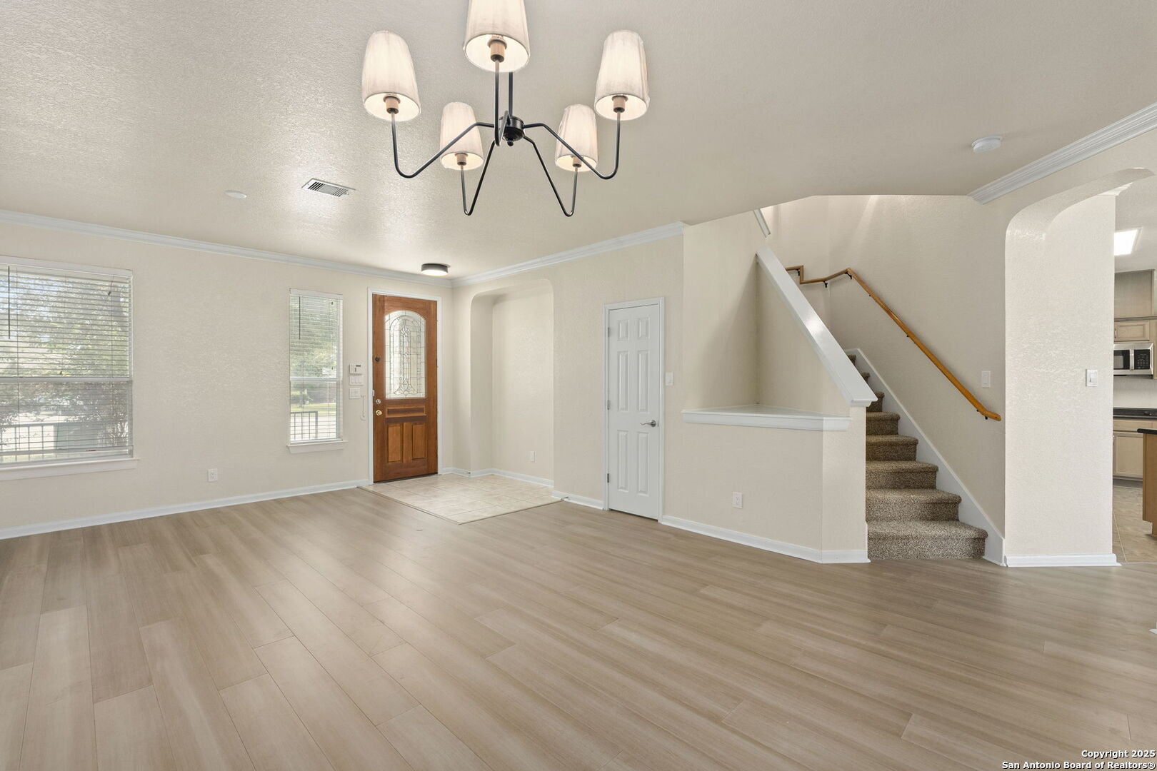 213 Springtree Parkway Cibolo, TX 78108 - Photo 7 of 33 a view of an entryway with wooden floor