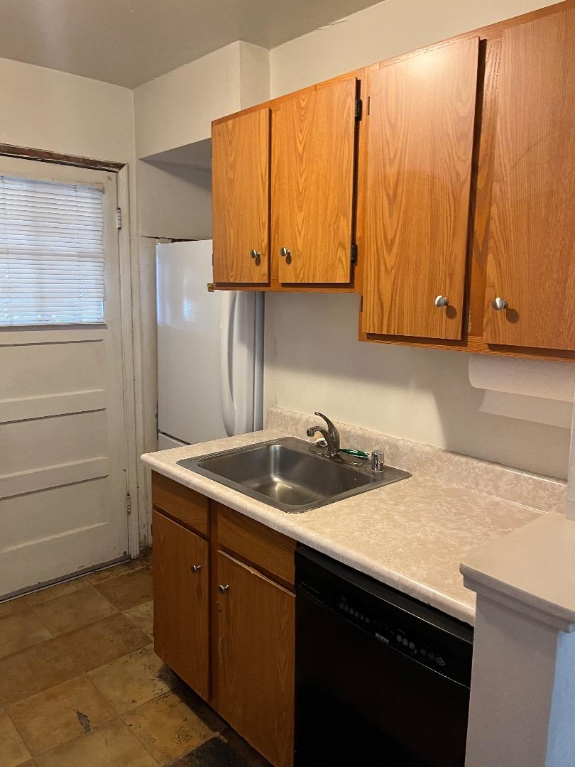 128 Laumer Avenue San Jose, CA 95127 - Photo 16 of 18 a kitchen with a sink and cabinets