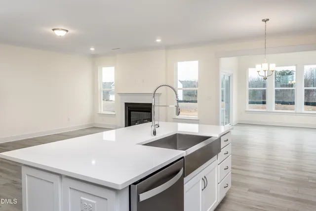 a hallway with view of wooden floor
