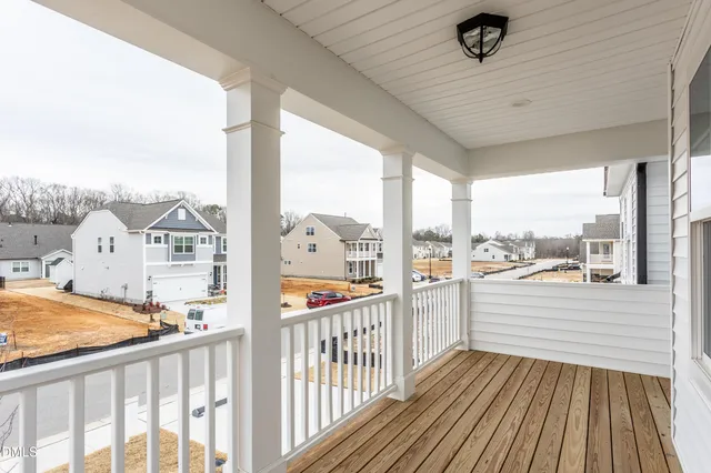 a bathroom with a sink toilet tub vanity and shower