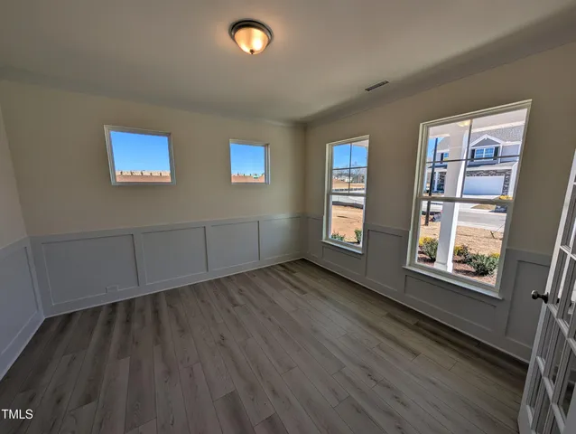 an empty room with windows