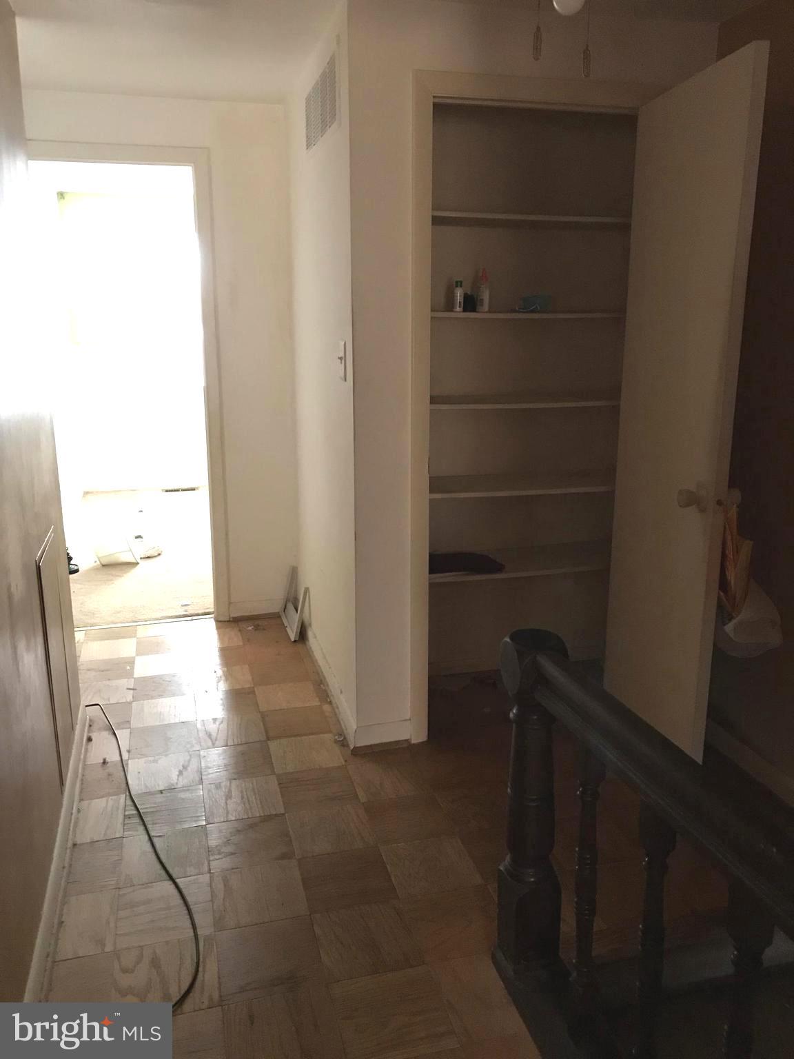 20 Lockett Court Baltimore, MD 21221 - Photo 20 of 31 Upper level hallway with large linen closet
