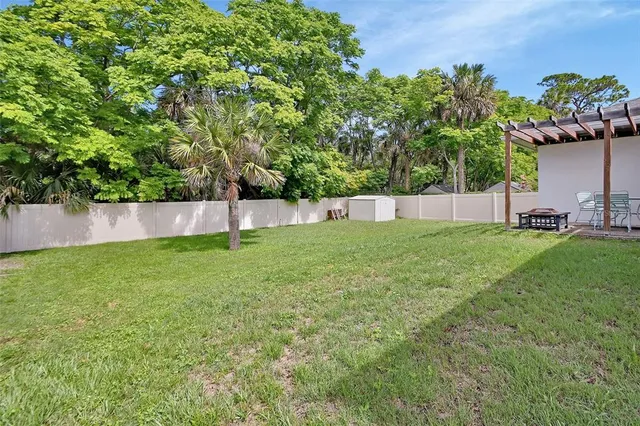 a view of a backyard with a garden