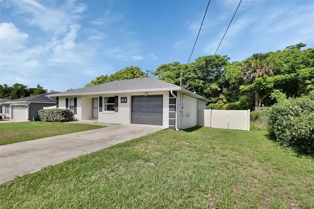 front view of a house with a yard