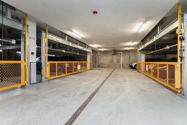 a view of an empty room with a hallway