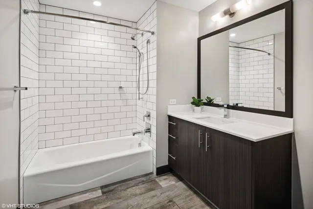 a bathroom with a sink and a bathtub
