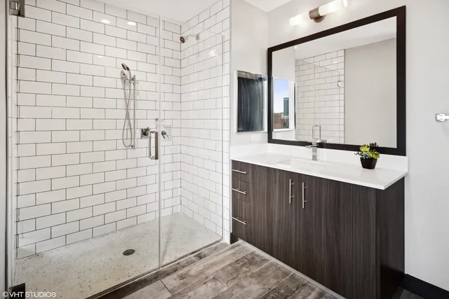 a view of city with tall buildings